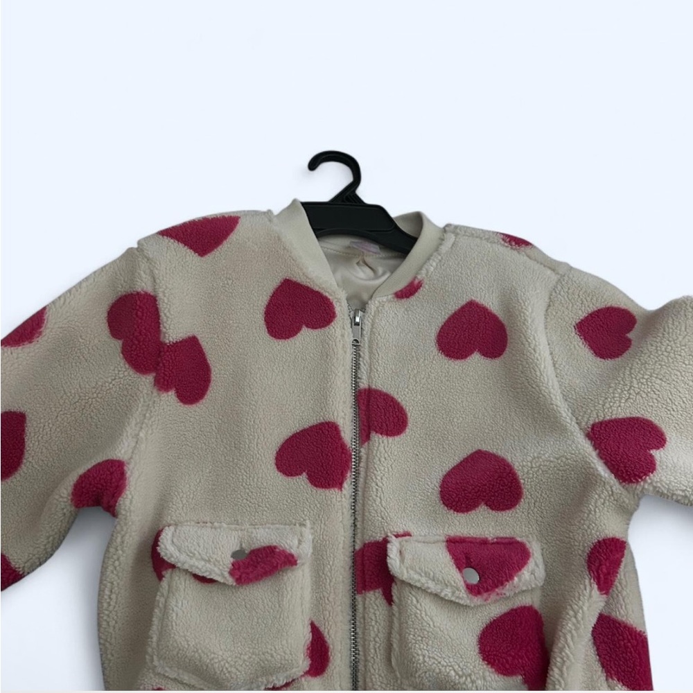 Tan and red heart bomber jacket.